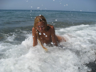 Amateur nudist in the beach