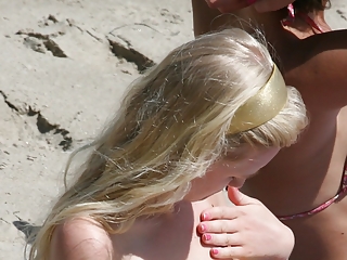 Exposed nipples in the beach