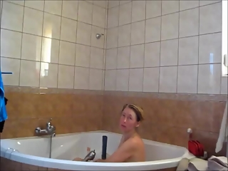 Wife taking bath in big bathtub