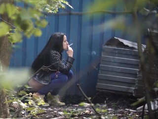 Black hair chick pees and smokes