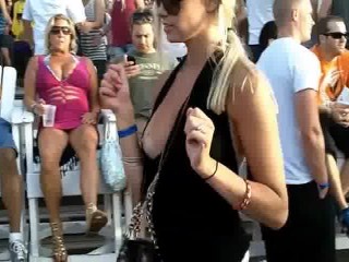 Busty blonde MILF gets her tits exposed in voyeur private video