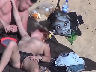 Red head fucked in the beach
