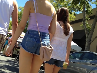 Two beautiful girls walking
