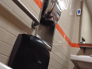 Latina pissing in toilet