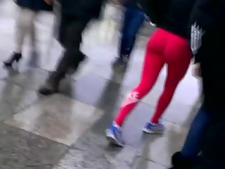 Sports woman in tight red pants