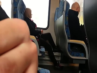 Guy in public transportation plays with his dick