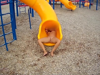 Exhibitionist woman naked in park