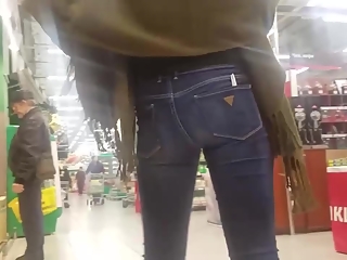 Girl buying bread in jeans