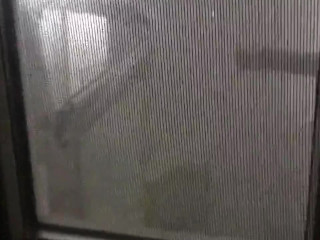 Window spy taking shower