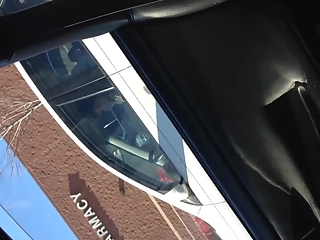 Guy wanking his cock in the parking lot