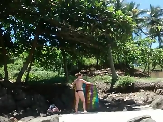 Voyeur secretly films woman in bikini sunbathing