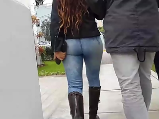 Long hair chick with nice ass wearing tight jeans