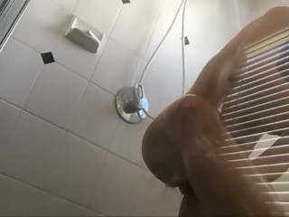 Housewife spied showering