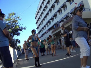 Nude in street painted bodies