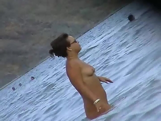 Chubby woman and small tits nudists