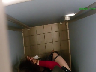 Woman spied in public toilet