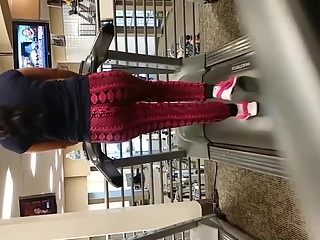 Big ass in sports pants walking