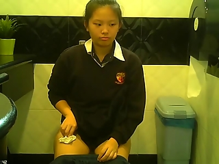 Asian teen spied in toilet pissing