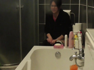 Wife in glasses pees