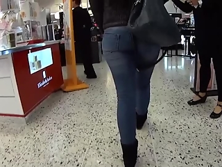 Woman in tight jeans pants and boots