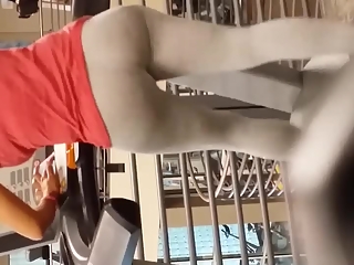 Big ass chick in grey leggings