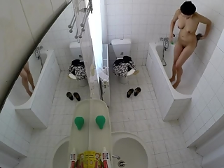 Sexy chick spied in bathroom taking shower