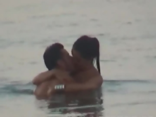 Couple having sex in the water