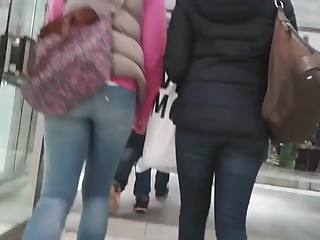 Two chicks in tight pants