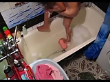Horny wife in bath tub