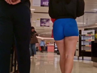 teen in blue sport shorts
