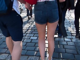 Girl in blue denim shorts