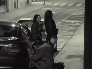 Girls caught peeing in the street sidewalk