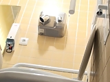 Spy in public toilet
