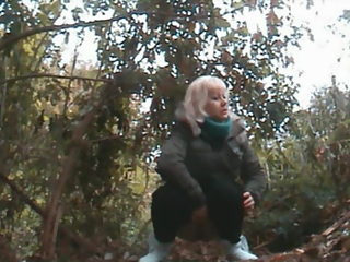 Blonde woman caught by camouflaged spy camera
