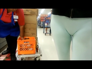 Woman in tight white panties at the supermarket