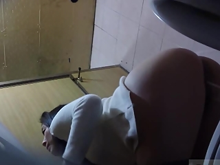 Asian women in public toilet peeing