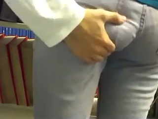 Guy Gropes Girlfriend's Butt in Library