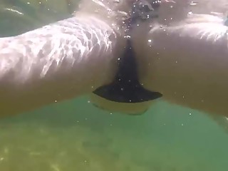 Bikini crotch in the beach water