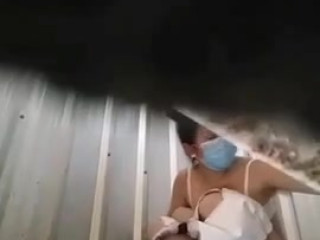 Hairy asian with mask pees