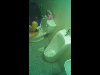 Two asian ladies pissing