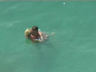 Couple filmed fucking in the water