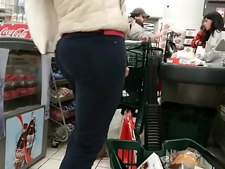 Long hair milf at the supermarket checkout