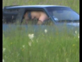 Horny couple caught fucking inside car