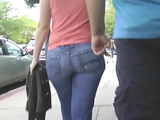 Big ass woman in tight jeans pants walking