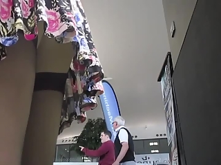 Woman flashes ass in shopping mall