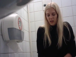 Pretty blonde caught peeing