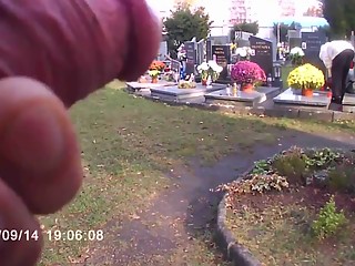 Flashes wanking cock in cemetery
