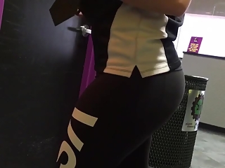 Curvy chick wearing black sports pants
