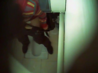 Woman caught peeing in toilet