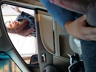 Guy flashing his cock inside car to girl